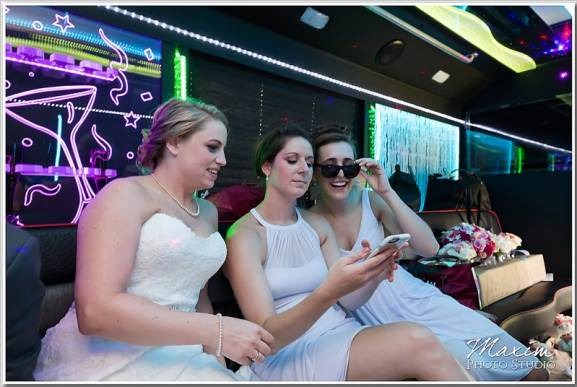 Happy customers enjoying luxury limousine service from cargoroute.pro during a memorable event.